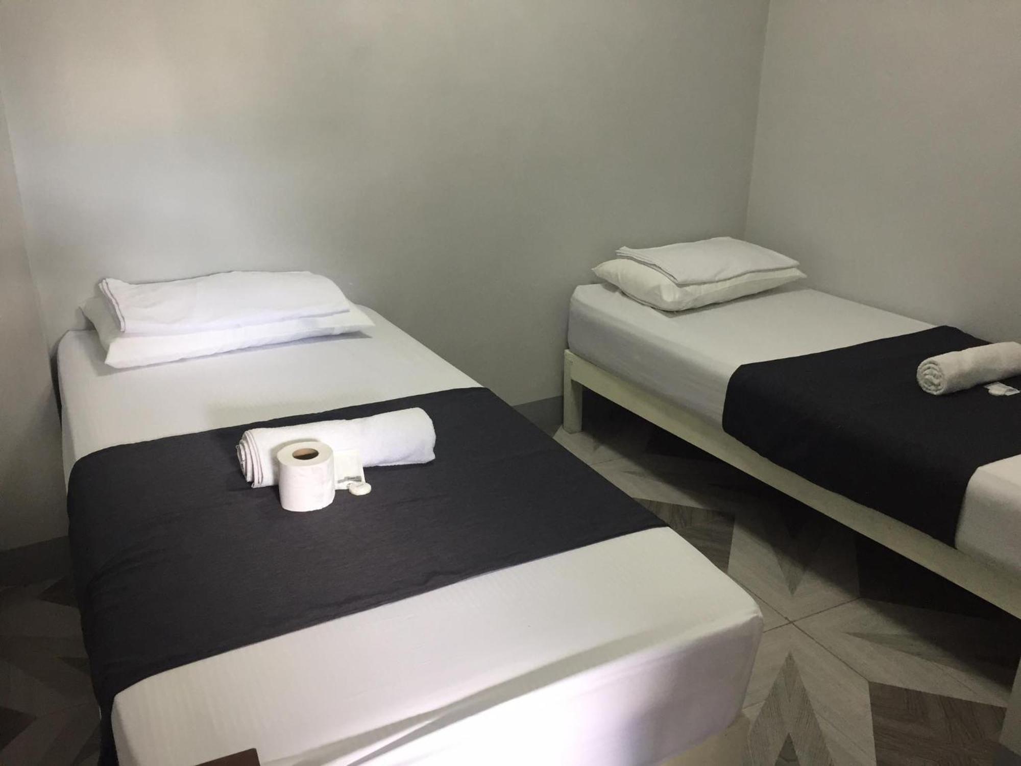 Ziet Hotel Mambajao Chambre photo